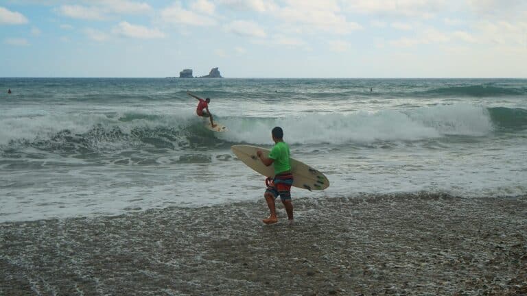 Surfers at Ayampe Beach