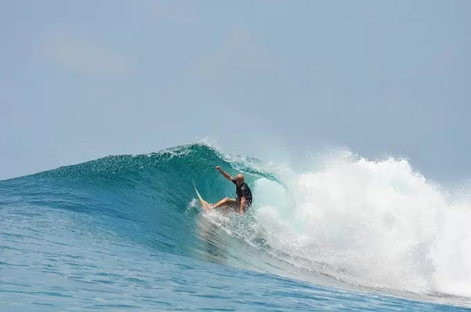 Surfing in the Maldives