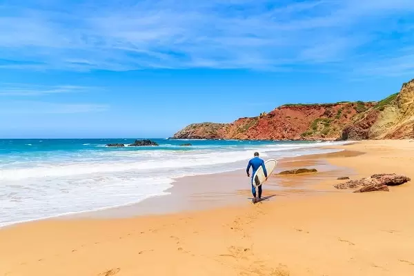 Surfer at Amado Beach