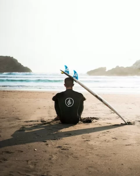 Surfer is looking at the waves
